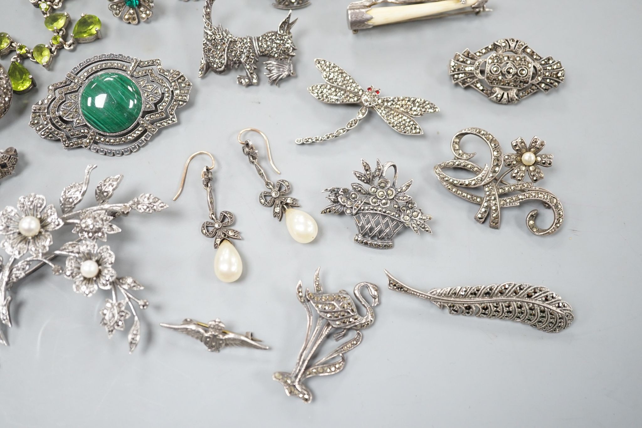 A small collection of assorted mainly white metal and marcasite set jewellery, including brooches, bracelet etc. and an enamelled RAF brooch.